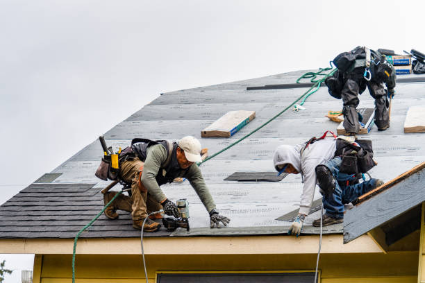 Professional Roofing technician working in Liberty, NY